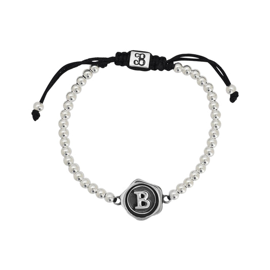 Pulsera inicial con terminado vintage en plata de ley