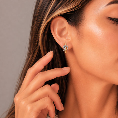 Aretes moño en plata con baño de oro rosa 18K con zirconia