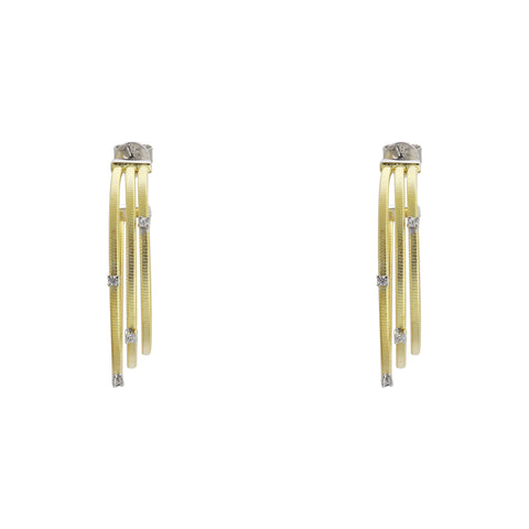 Arracadas tres líneas en plata con baño de oro amarillo 14K con zirconia