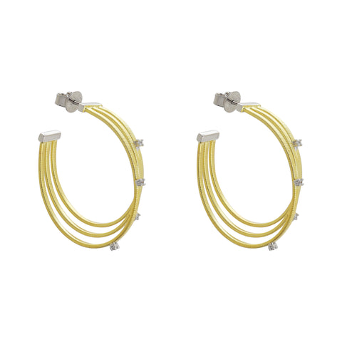 Arracadas tres líneas en plata con baño de oro amarillo 14K con zirconia