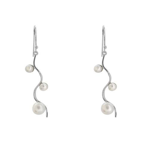 Aretes largos en plata con perla