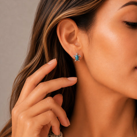 Aretes tortuga de mar en plata de ley con ópalo azul
