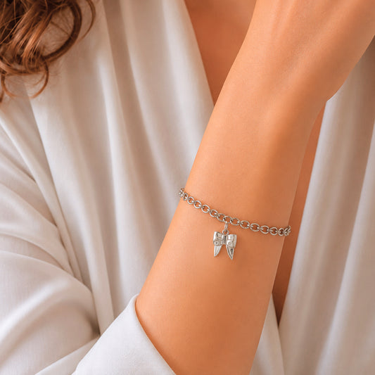Charm de moño en plata de ley