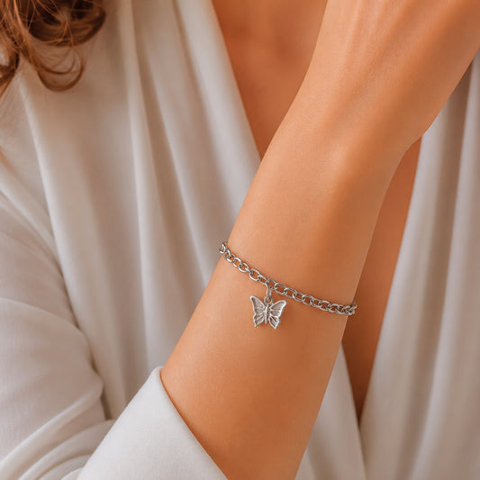 Charm mariposa en plata de ley