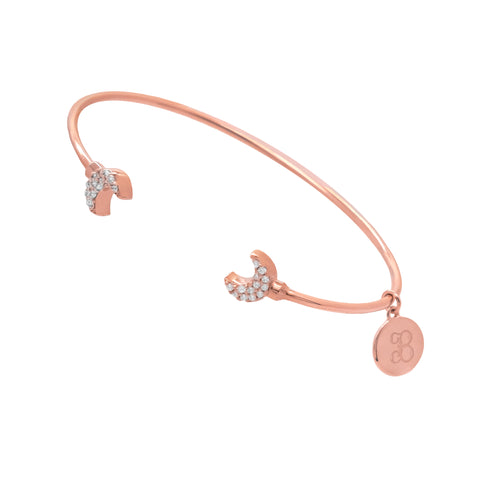 Brazalete doble media luna en plata con baño de oro rosa 18K con zirconia