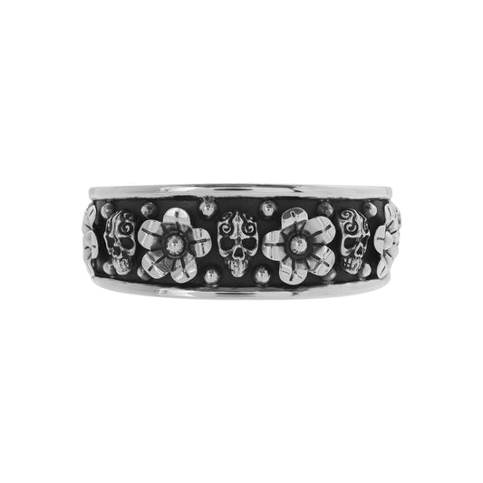 Brazalete ajustable con flores en acabado oxidado en plata