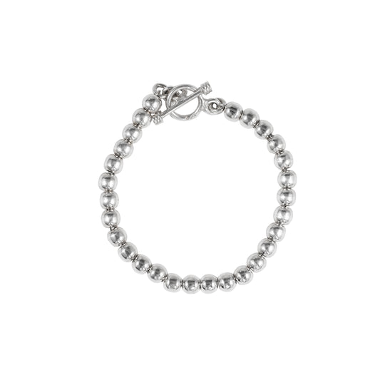 Pulsera con casquilla martillada en plata .925