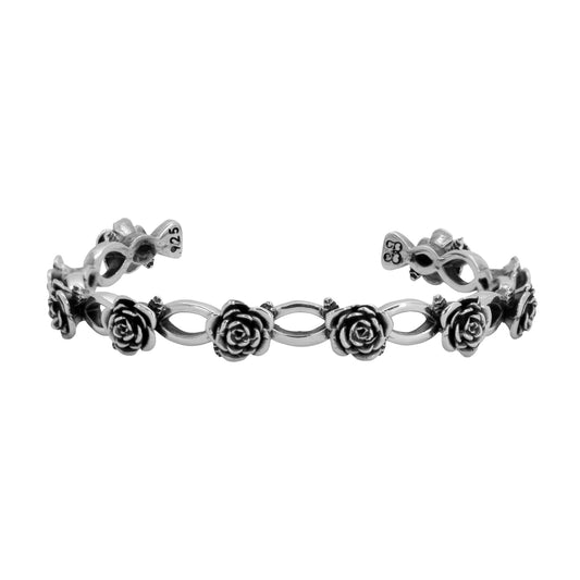 Brazalete de rosas con acabado oxidado en plata de ley