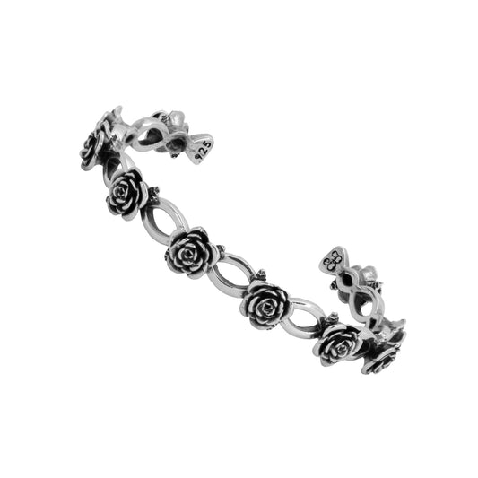 Brazalete de rosas con acabado oxidado en plata de ley