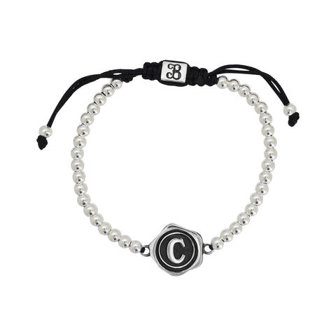 Pulsera inicial acabado oxidado en plata de ley