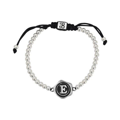 Pulsera inicial acabado oxidado en plata de ley