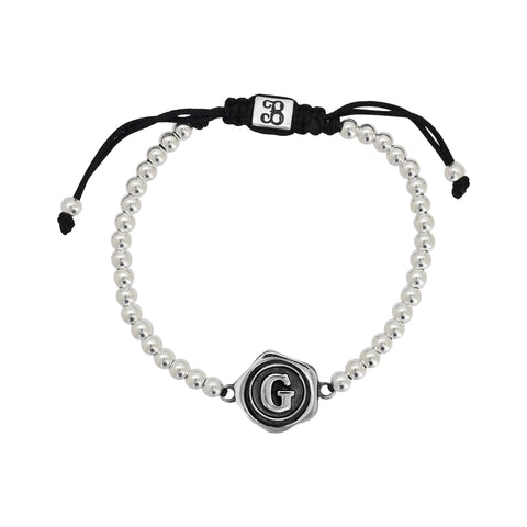 Pulsera inicial acabado oxidado en plata de ley