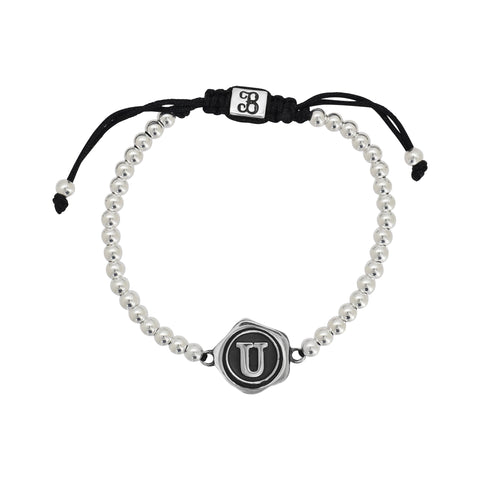 Pulsera inicial acabado oxidado en plata de ley